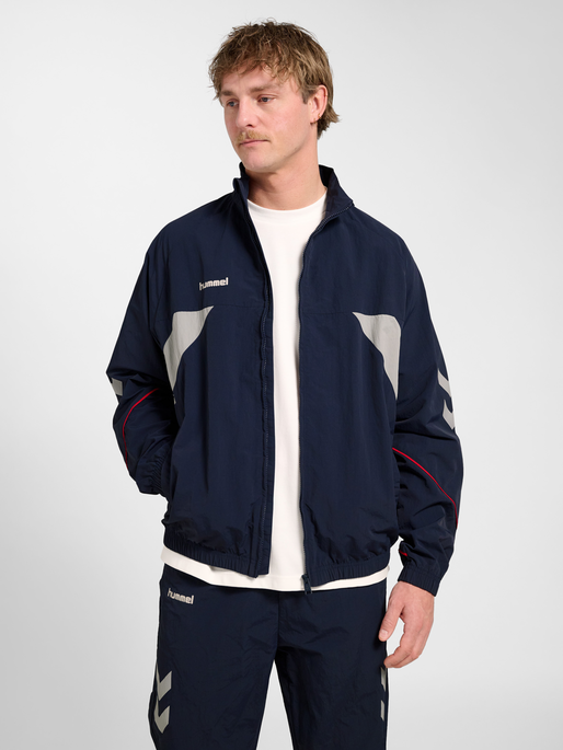 hmlWORLD 26 TRACK ZIP JACKET, DARK SAPPHIRE, model