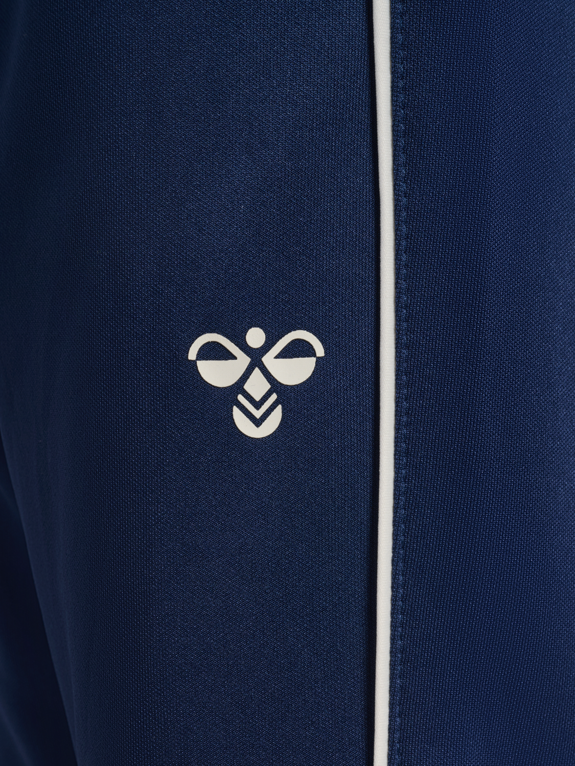 hmlJR REG TUKAS TRACK SUIT, DRESS BLUES, packshot